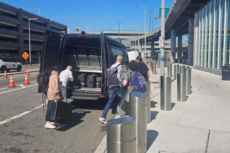 How to Plan Your Airport Pickup in New York: A Traveler’s Guide - curbside at the terminal JFK Airport Shuttle Guide: Price, Pickup, Routes, and How It Works